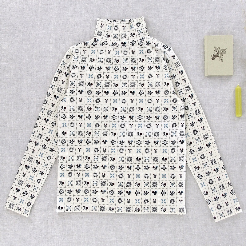 Snap Turtleneck in Cream Folk Quilt by Iver & Isla